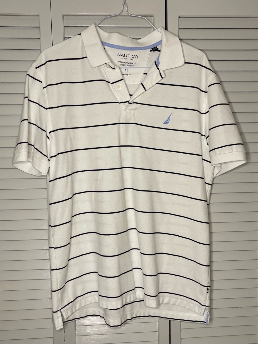 Nautica White Polo with Navy Stripes and Light Blue Logo